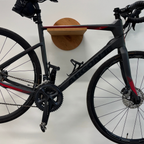 Support vélo mural design rond, avec tablette