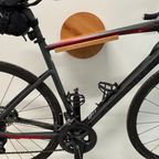 Support vélo mural design rond, avec tablette